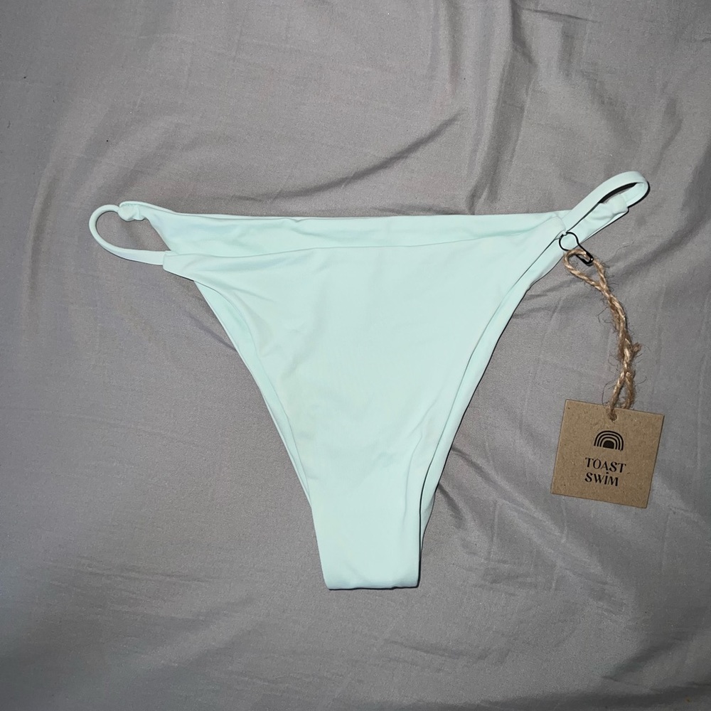 TOAST bottoms in blue glass